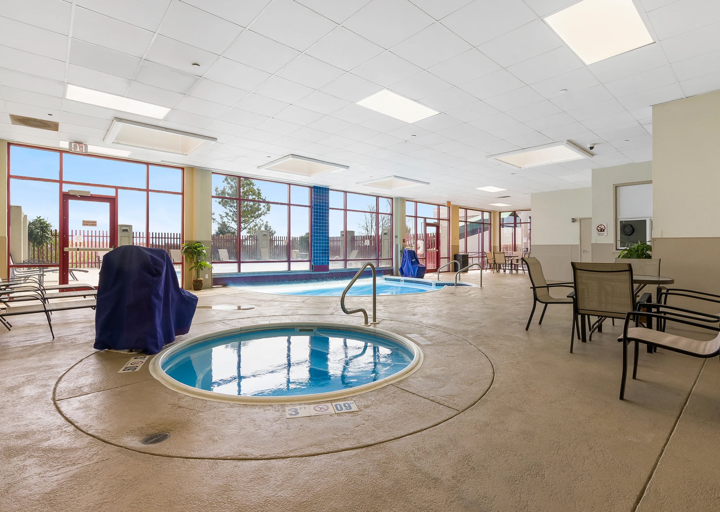 Indoor pool with hot tub at Thousand Hills Resort Hotel in Branson, Missouri