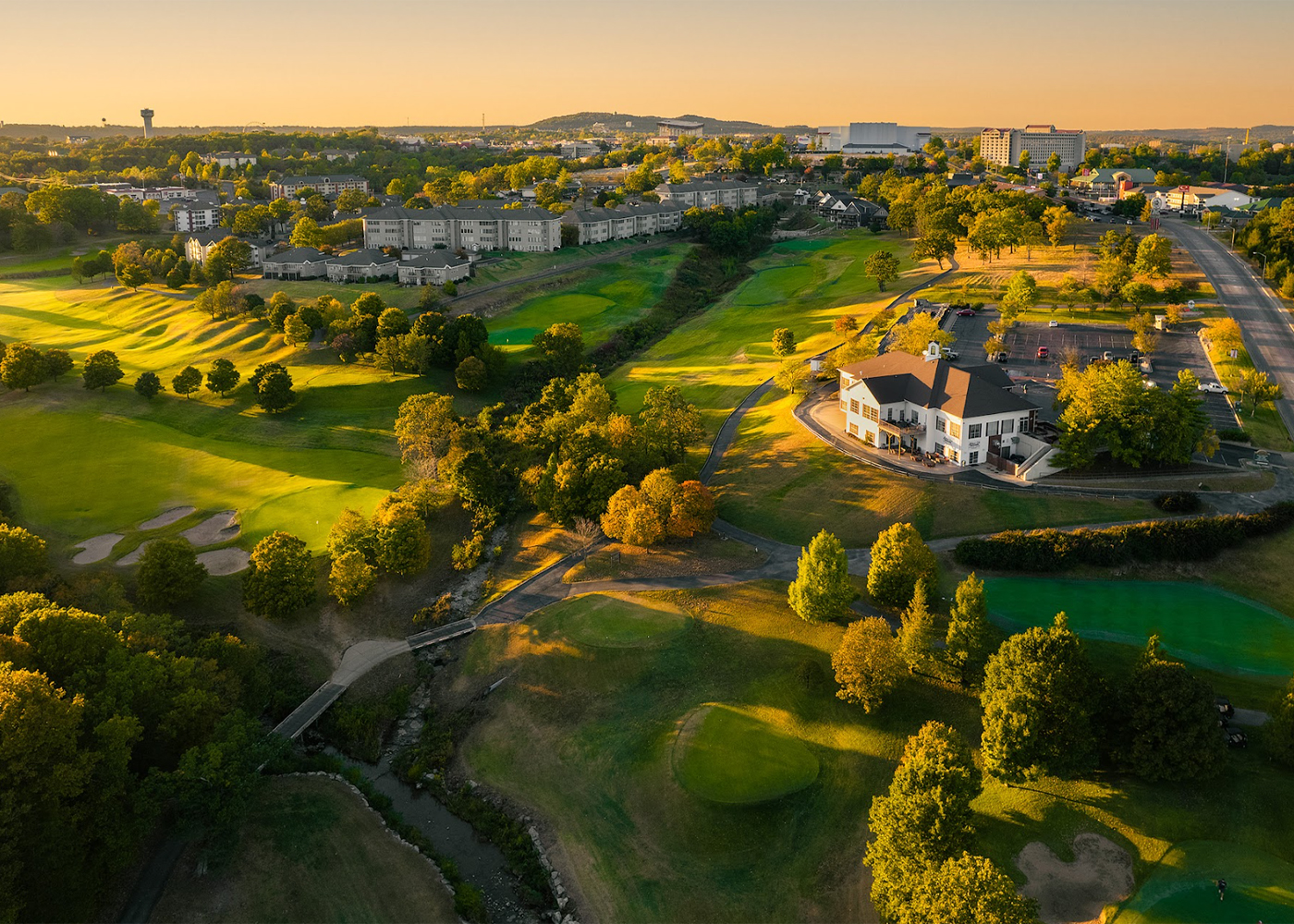 Aerial view of Thousand Hills Golf Course fairways and Ozark tree line surrounding the 18-hole course adjacent to Thousand Hills Resort Hotel Branson Missouri