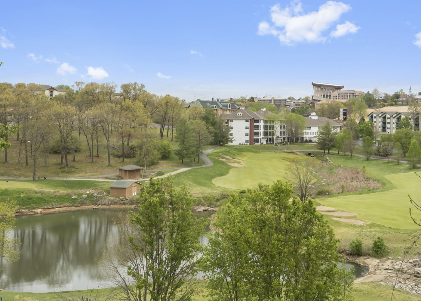 Thousand Hills Golf Course fairway with rolling Ozark hills in the background, adjacent to Thousand Hills Resort Hotel in Branson Missouri