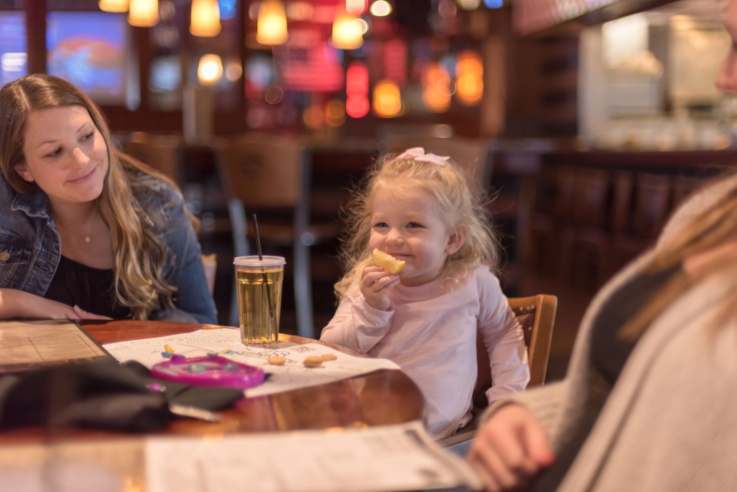 Family dining at a restaurant near Highway 76 in Branson Missouri