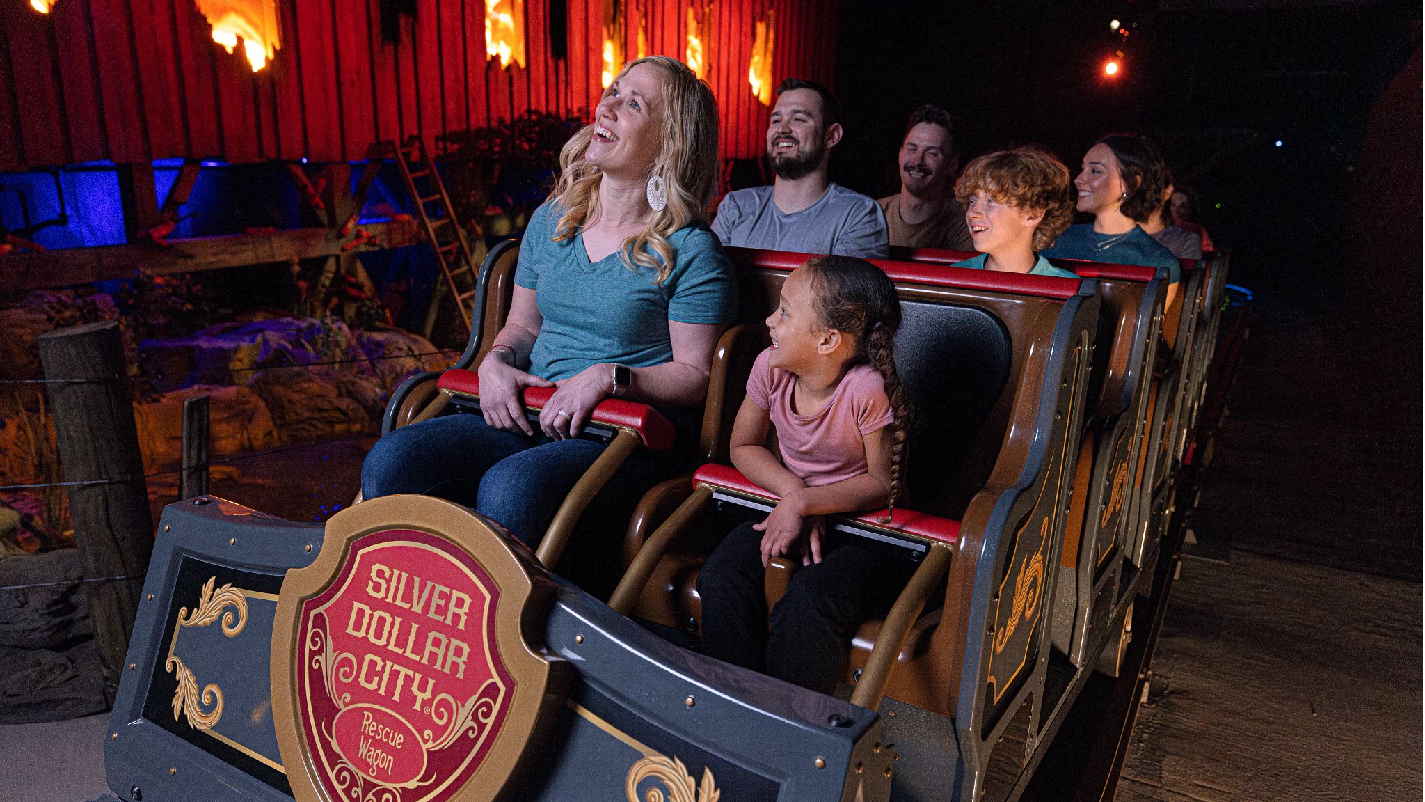 Multigenerational family riding the Fire In The Hole coaster at Silver Dollar City in Branson