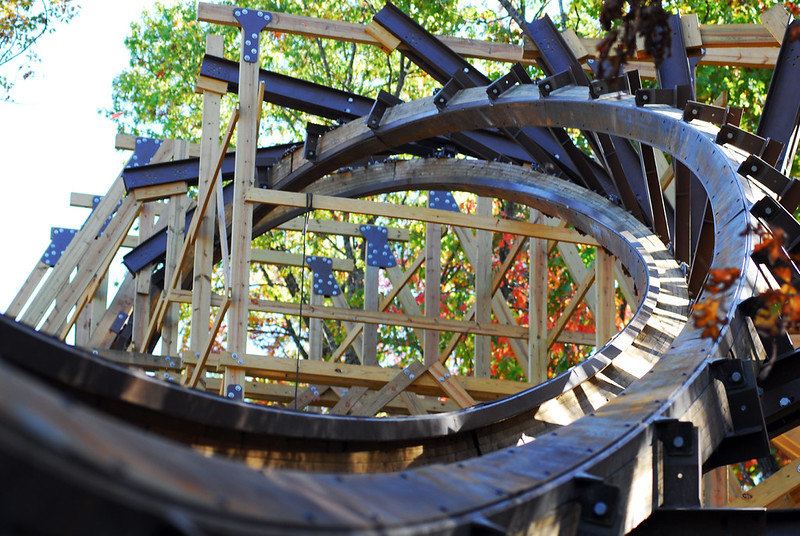 Outlaw Run wooden roller coaster at Silver Dollar City in Branson Missouri with fall foliage in the background